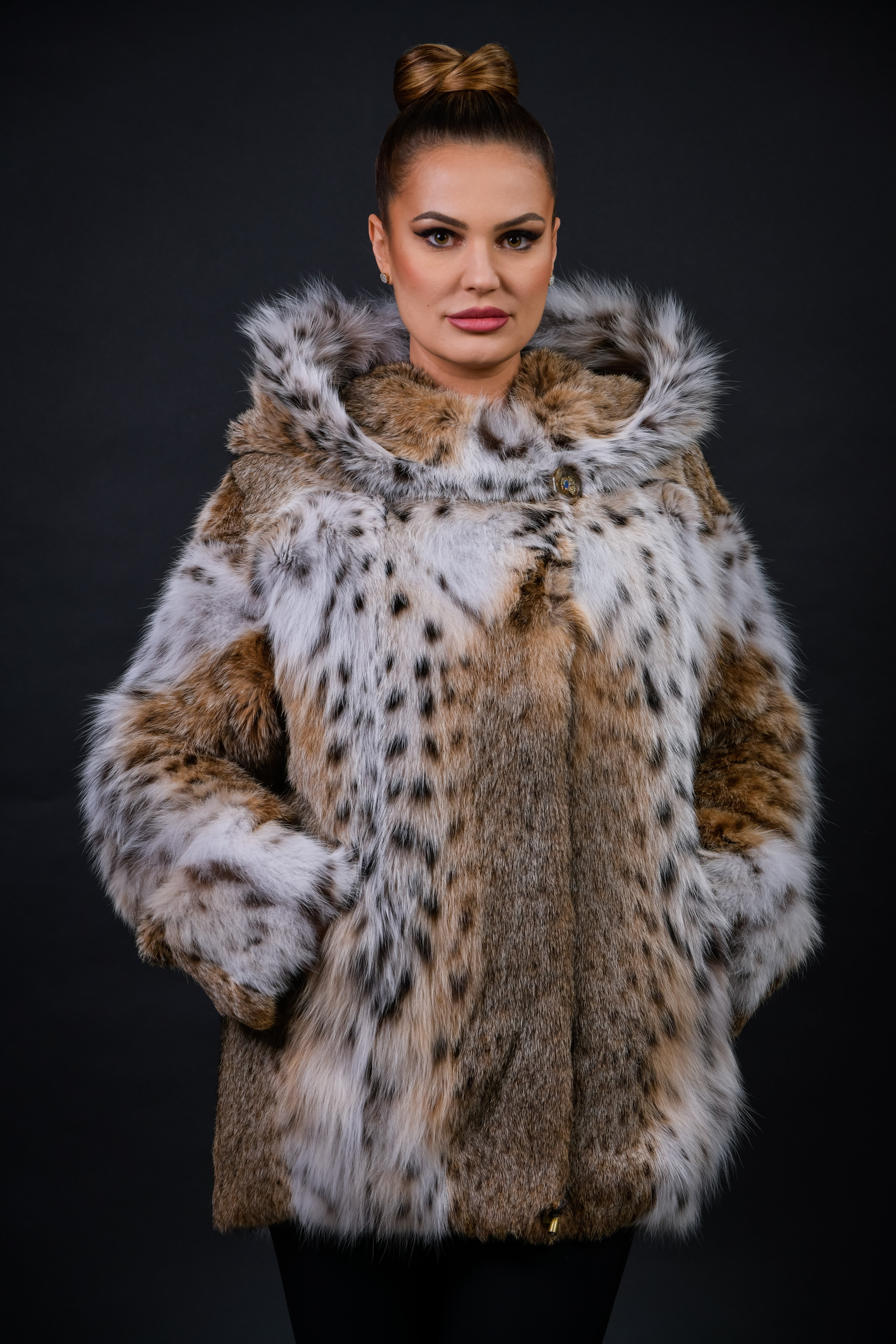Haină din blană naturală de Linx cu gluga